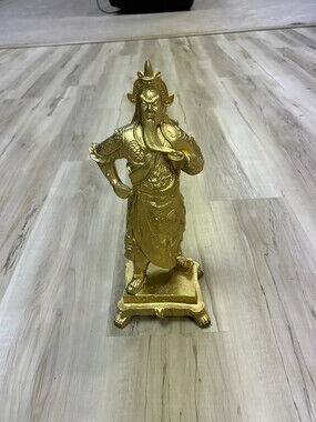 vintage Guan Yu statue depicting the Chinese warrior god of wealth and war.
